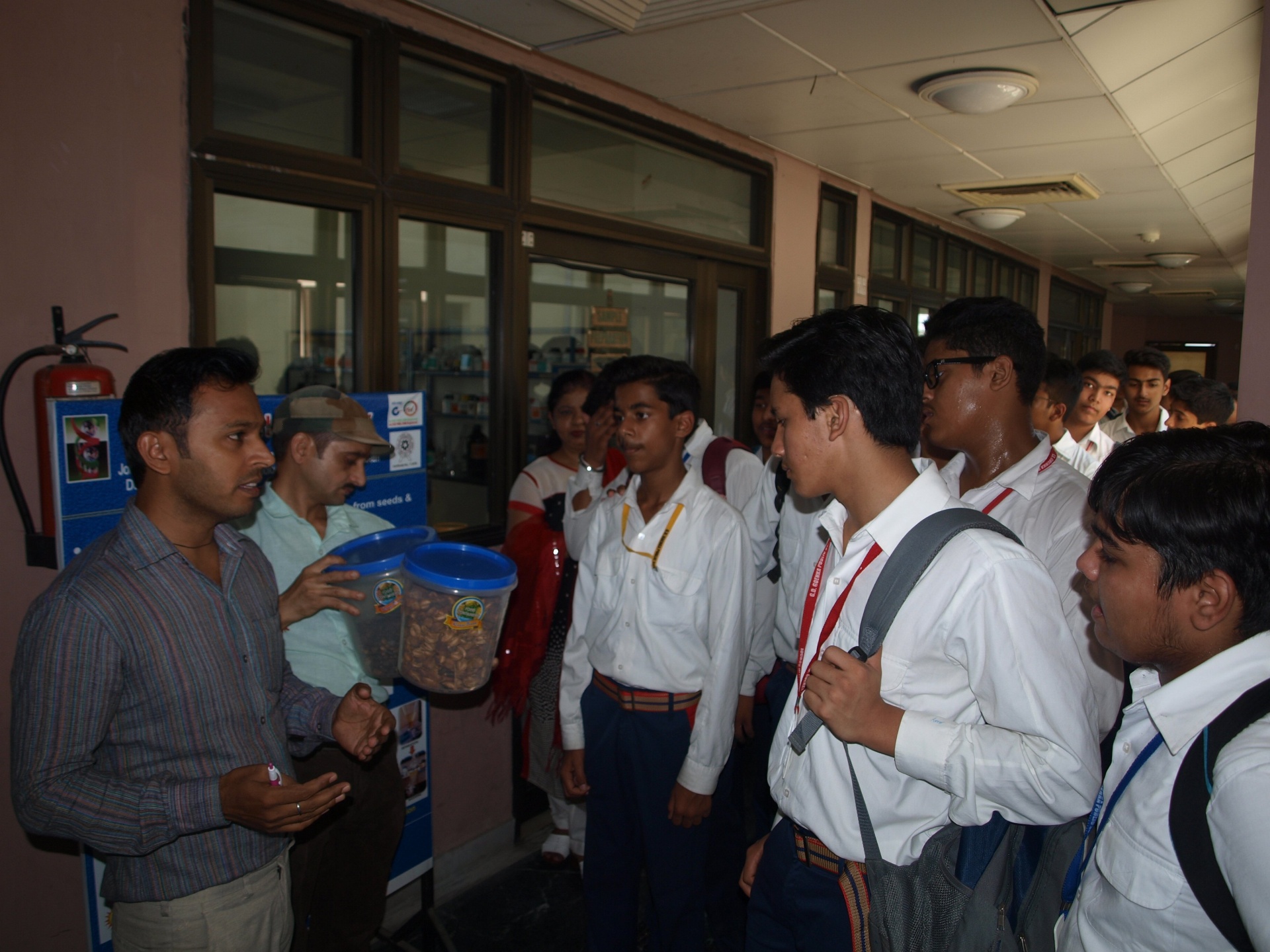 Scientist demonstrating biotech products to GD Goenka students at the park