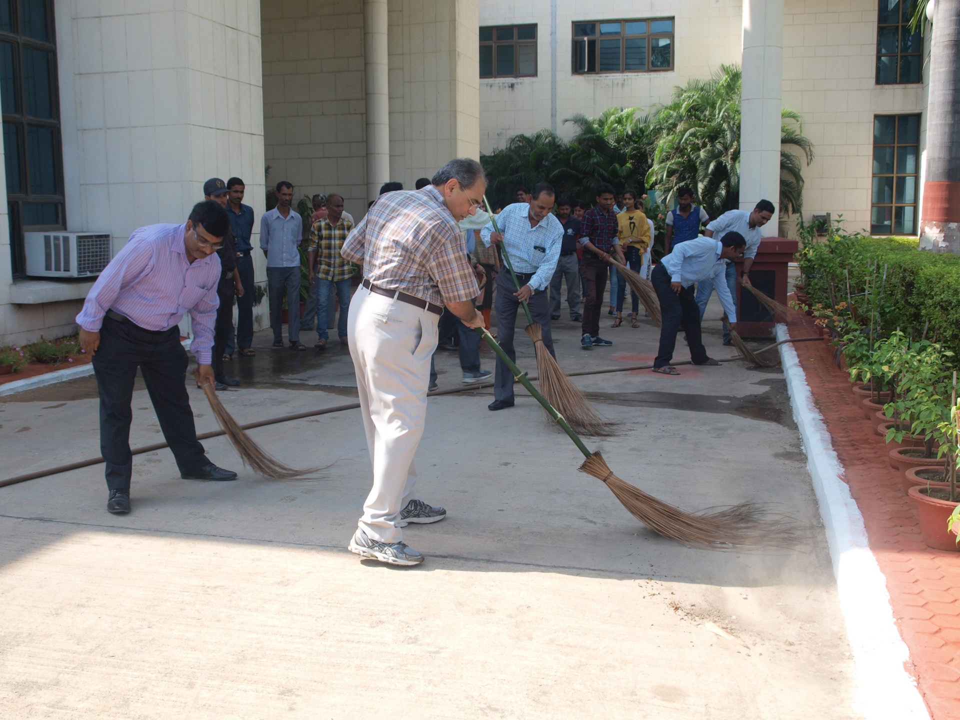 Officials participating in Swachhta Abhiyan cleanliness drive at Biotech Park